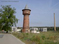 Wasserturm, Schornstein und Neubauten auf dem Schwellenwerk Zernsdorf
