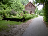 Hellmühle Holzhaus Garten